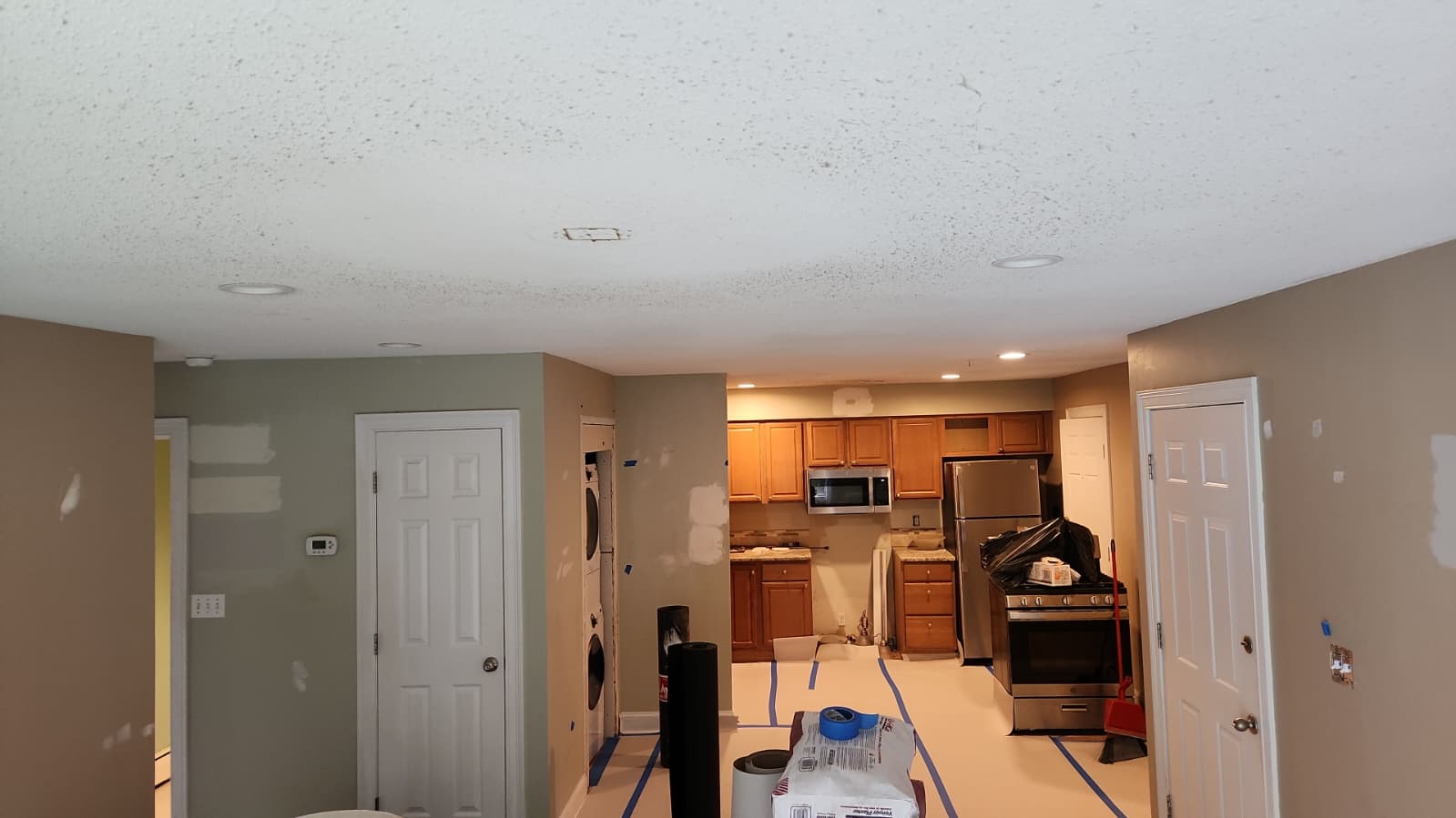 Wall repairs in progress in a protected kitchen